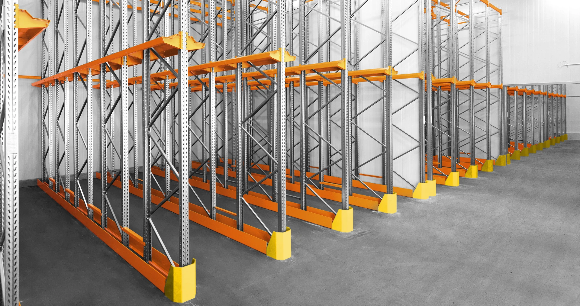 Heavy-duty industrial pallet racking inside a modern warehouse manufactured by KFurnitures